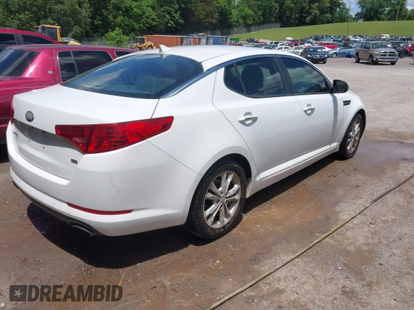 2013 Kia Optima LX z VIN 5XXGM4A7XDG197818, wystawiony jako IAAI lot #42340379 z przebiegiem 185 144 mil mil oraz . Historia ofert i sprzedaży dostępna na DreamBid. Obrazek 4.