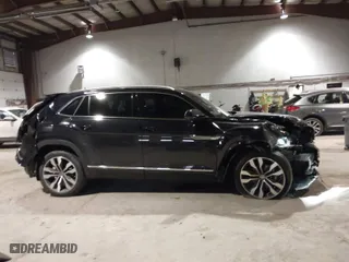 2022 Volkswagen Atlas Cross Sport 3.6L V6 SEL Premium R-Line with VIN 1V2FE2CAXNC204546, listed as a IAAI auction lot 41124737 with 51,226 mi miles. Bid and sale history available at carsss.com. Image 13.