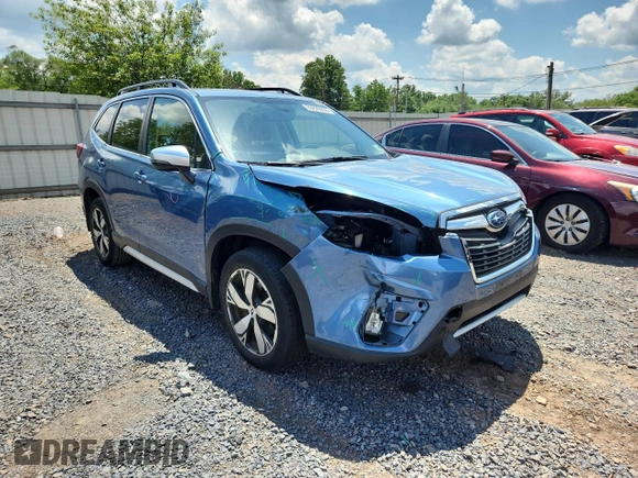 2020 Subaru Forester Touring with VIN JF2SKAXC3LH421386, listed as a Copart auction lot 63639205 with 38,559 mi miles and Salvage title. Bid and sale history available at DreamBid. Image 4.