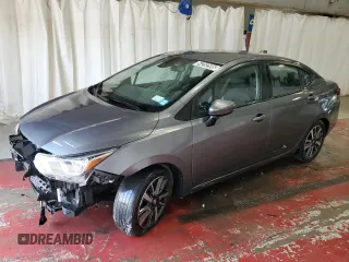 2021 Nissan Versa SV z VIN 3N1CN8EV5ML821544, wystawiony jako Copart lot #54252595 z przebiegiem 89 447 mil mil oraz Czysty tytuł • Clean title. Historia ofert i sprzedaży dostępna na DreamBid. Obrazek 1.