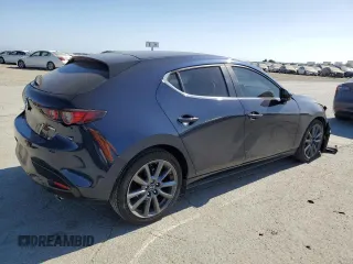 2020 Mazda 3 with VIN JM1BPALM9L1159882, listed as a Copart auction lot 61765925 with 59,494 mi miles and Salvage title. Bid and sale history available at DreamBid. Image 3.