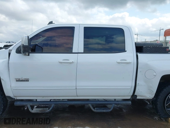 2017 Chevrolet Silverado 1500 LT with VIN 3GCPCREC6HG311064, listed as a IAAI auction lot 42026646 with 242,195 mi miles and . Bid and sale history available at DreamBid. Image 13.
