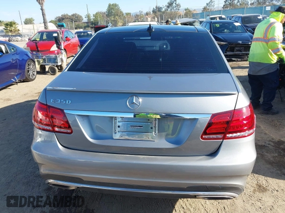 2014 Mercedes-Benz E 350 Sport with VIN WDDHF5KB1EA979547, listed as a IAAI auction lot 42000619 with 128,104 mi miles and . Bid and sale history available at carsss.com. Image 16.