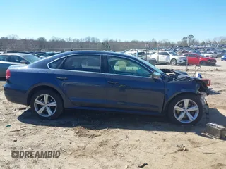 2013 Volkswagen Passat SE w/Sunroof & Nav with VIN 1VWBP7A35DC113692, listed as a IAAI auction lot 41720111 with 143,624 mi miles. Bid and sale history available at carsss.com. Image 13.