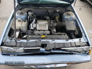 1989 Oldsmobile Delta z VIN 1G3HN54C8KH301125, wystawiony jako Copart lot #70709764 z przebiegiem 87 068 mil mil oraz Tytuł czysty. Historia ofert i sprzedaży dostępna na DreamBid. Obrazek 13.