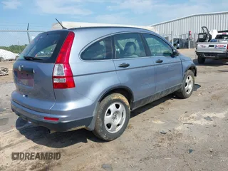 2010 Honda CR-V LX with VIN 3CZRE3H39AG701619, listed as a IAAI auction lot 41986031 with 107,200 mi miles and . Bid and sale history available at DreamBid. Image 4.