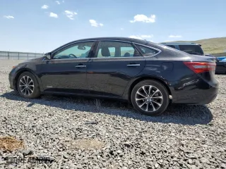 2016 Toyota Avalon Hybrid XLE Premium with VIN 4T1BD1EBXGU048701, listed as a Copart auction lot 58066293 with 103,552 mi miles. Bid and sale history available at carsss.com. Image 2.