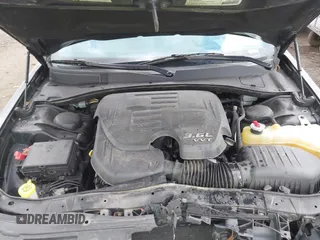 2015 Chrysler 300 with VIN 2C3CCAGGXFH831351, listed as a IAAI auction lot 41721941 with 106,577 mi miles. Bid and sale history available at carsss.com. Image 10.