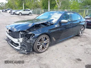 2019 BMW 5 Series M550i xDrive with VIN WBAJB9C51KB289355, listed as a IAAI auction lot 41867984 with 30,106 mi miles and . Bid and sale history available at DreamBid. Image 17.