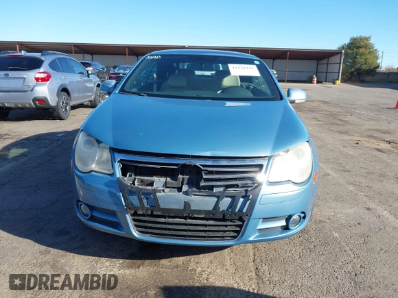 2008 Volkswagen Eos Turbo z VIN WVWBA71F68V026196, wystawiony jako IAAI lot #41238435 z przebiegiem 102 643 mil mil oraz . Historia ofert i sprzedaży dostępna na DreamBid. Obrazek 12.