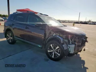 2018 Toyota RAV4 XLE with VIN 2T3WFREVXJW457073, listed as a Copart auction lot 62339635 with 75,321 mi miles and Salvage title. Bid and sale history available at DreamBid. Image 4.