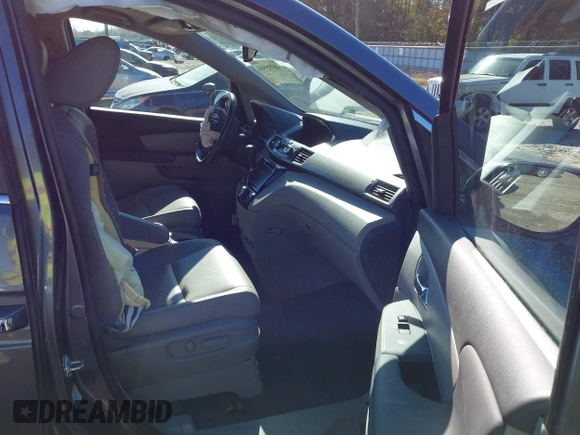2016 Honda Odyssey EX-L with VIN 5FNRL5H69GB047902, listed as a IAAI auction lot 40795564 with 124,788 mi miles. Bid and sale history available at carsss.com. Image 5.