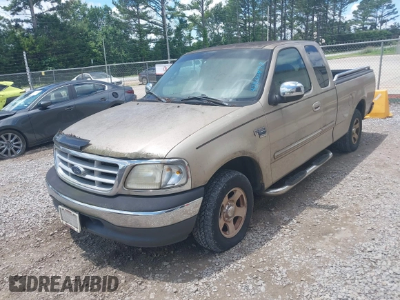 1999 Ford F-150 XL z VIN 1FTRX17LXXNB88516, wystawiony jako IAAI lot #42400493 z przebiegiem 254 085 mil mil oraz . Historia ofert i sprzedaży dostępna na DreamBid. Obrazek 6.