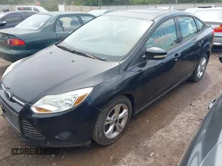 2013 Ford Focus SE z VIN 1FADP3F27DL183754, wystawiony jako IAAI lot #42677654 z przebiegiem 117 966 mil mil oraz . Historia ofert i sprzedaży dostępna na DreamBid. Obrazek 2.