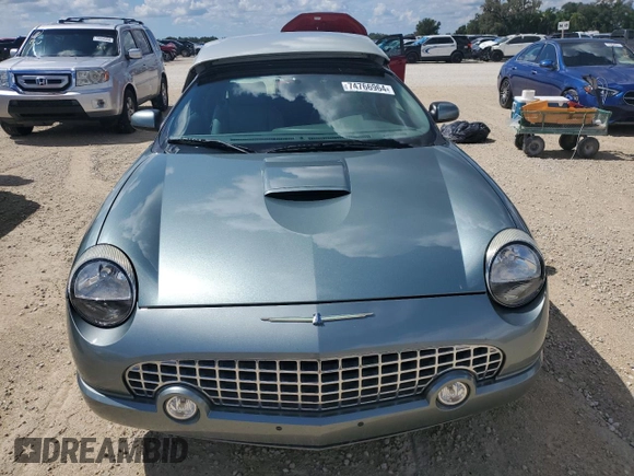 2004 Ford Thunderbird Pacific Coast Roadster with VIN 1FAHP63A04Y108766, listed as a Copart auction lot 74766964 with 30,107 mi miles and Salvage Title. Bid and sale history available at DreamBid. Image 5.