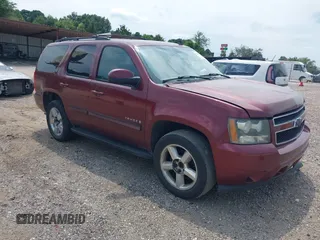 2008 Chevrolet Tahoe LTZ with VIN 1GNFC13098J122520, listed as a IAAI auction lot 39965702 with 319,069 mi miles and . Bid and sale history available at DreamBid. Image 1.