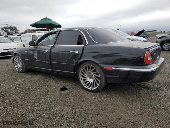 2004 Jaguar XJ VDP with VIN SAJWA74C54SG16196, listed as a Copart auction lot 45329975 with NaN miles and Salvage Title. Bid and sale history available at carsss.com. Image 2.