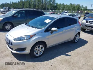 2016 Ford Fiesta SE z VIN 3FADP4EJ0GM122392, wystawiony jako IAAI lot #42364419 z przebiegiem 98 357 mil mil oraz . Historia ofert i sprzedaży dostępna na DreamBid. Obrazek 2.