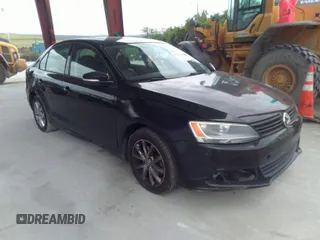 2011 Volkswagen Jetta Sedan SE with VIN 3VWDX7AJ7BM390282, listed as a IAAI auction lot 41673478 with 196,094 mi miles. Bid and sale history available at carsss.com. Image 1.