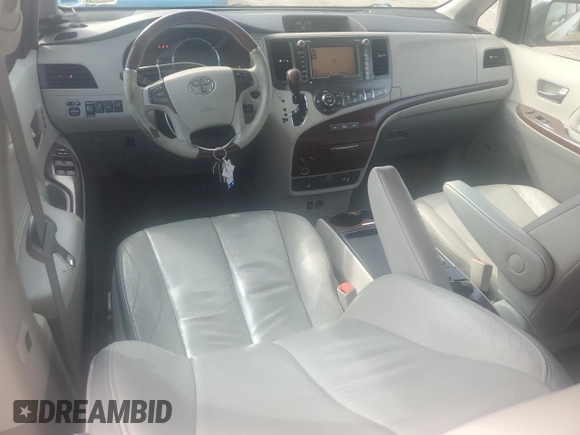 2011 Toyota Sienna XLE with VIN 5TDDK3DC8BS028811, listed as a Copart auction lot 51838095 with 114,506 mi miles and Salvage Title. Bid and sale history available at DreamBid. Image 8.