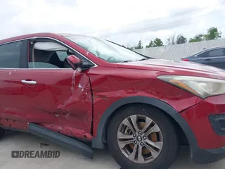 2016 Hyundai Santa Fe z VIN 5XYZT3LB1GG321854, wystawiony jako IAAI lot #40244942 z przebiegiem Nie podano mil oraz . Historia ofert i sprzedaży dostępna na DreamBid. Obrazek 6.