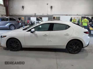 2021 Mazda 3 Premium with VIN JM1BPBML6M1348258, listed as a IAAI auction lot 42752477 with 35,285 mi miles and . Bid and sale history available at DreamBid. Image 14.