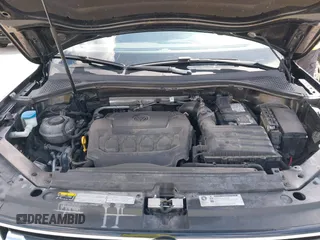 2019 Volkswagen Tiguan S with VIN 3VV0B7AX3KM119645, listed as a IAAI auction lot 41973924 with 100,914 mi miles and . Bid and sale history available at DreamBid. Image 10.
