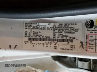 2014 Ford Fiesta S with VIN 3FADP4TJ0EM177375, listed as a Copart auction lot 58960655 with 179,096 mi miles and Salvage title. Bid and sale history available at DreamBid. Image 12.