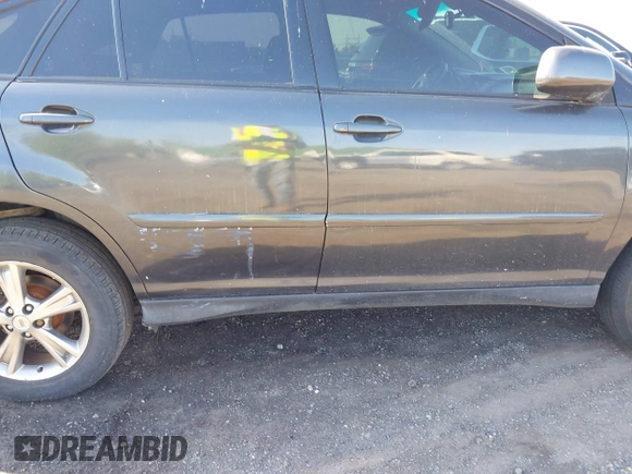 2006 Lexus RX 400h with VIN JTJHW31UX62000621, listed as a IAAI auction lot 42153940 with 196,848 mi miles and . Bid and sale history available at DreamBid. Image 13.
