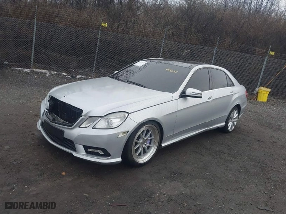 2011 Mercedes-Benz E-Class E 350 Luxury with VIN WDDHF5GB9BA499003, listed as a IAAI auction lot 41533557 with 112,164 mi miles. Bid and sale history available at carsss.com. Image 2.