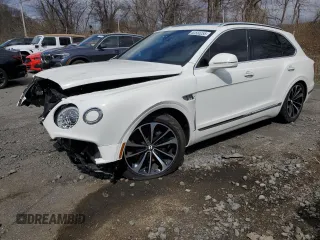 2020 Bentley Bentayga V8 z VIN SJAAM2ZV2LC028213, wystawiony jako Copart lot #52550255 z przebiegiem 50 238 mil mil oraz Szkody całkowita. Historia ofert i sprzedaży dostępna na DreamBid. Obrazek 1.