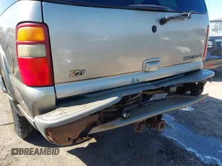 2003 Chevrolet Suburban Z71 with VIN 3GNFK16Z33G253479, listed as a IAAI auction lot 41871504 with 157,990 mi miles and . Bid and sale history available at DreamBid. Image 17.