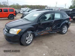 2009 Dodge Caliber SXT z VIN 1B3HB48A79D236542, wystawiony jako IAAI lot #42138476 z przebiegiem Nie podano mil oraz . Historia ofert i sprzedaży dostępna na DreamBid. Obrazek 6.