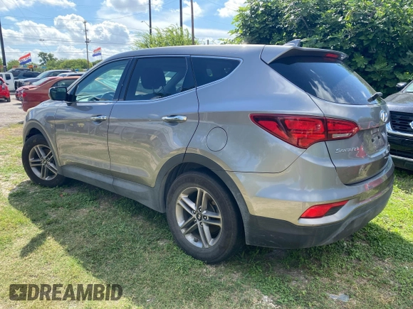 2017 Hyundai Santa Fe 2.4L with VIN 5NMZTDLB8HH029955, listed as a IAAI auction lot 42612654 with 153,050 mi miles and . Bid and sale history available at DreamBid. Image 3.