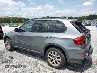 2012 BMW X5 35i with VIN 5UXZV4C50CL991452, listed as a Copart auction lot 56890265 with 147,019 mi miles and Salvage title. Bid and sale history available at DreamBid. Image 2.