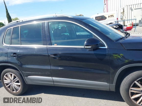 2015 Volkswagen Tiguan SE with VIN WVGAV7AX5FW509612, listed as a IAAI auction lot 42020599 with 64,201 mi miles and . Bid and sale history available at DreamBid. Image 13.