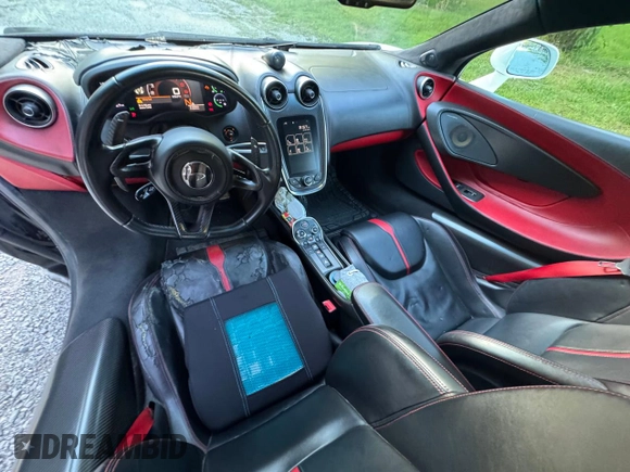 2016 McLaren 570S z VIN SBM13DAA2GW000588, wystawiony jako Copart lot #81412784 z przebiegiem 50 200 mil mil oraz Tytuł czysty. Historia ofert i sprzedaży dostępna na DreamBid. Obrazek 9.