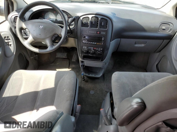 2007 Dodge Grand Caravan SE with VIN 1D4GP24R17B233725, listed as a Copart auction lot 58557245 with 306,473 mi miles and Salvage title. Bid and sale history available at DreamBid. Image 8.