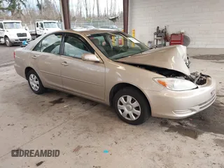 2004 Toyota Camry LE with VIN 4T1BE32K04U925558, listed as a IAAI auction lot 41818296 with 192,201 mi miles and . Bid and sale history available at DreamBid. Image 1.
