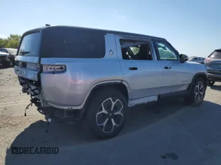 2024 Rivian R1S Adventure with VIN 7PDSGBBA4RN036045, listed as a Copart auction lot 74982414 with 9,256 mi miles and Salvage Title. Bid and sale history available at carsss.com. Image 3.