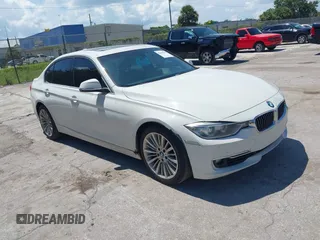 2014 BMW 3 Series 328i with VIN WBA3A5C54EP600398, listed as a IAAI auction lot 42665302 with 117,012 mi miles and . Bid and sale history available at DreamBid. Image 1.