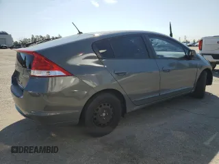 2010 Honda Insight EX z VIN JHMZE2H73AS034380, wystawiony jako Copart lot #49178935 z przebiegiem 214 256 mil mil oraz Szkoda całkowita • Salvage title. Historia ofert i sprzedaży dostępna na DreamBid. Obrazek 3.