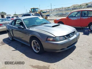 2003 Ford Mustang GT Deluxe with VIN 1FAFP42X03F331949, listed as a IAAI auction lot 42587690 with 58,187 mi miles and . Bid and sale history available at DreamBid. Image 1.