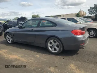 2015 BMW 4 Series 428i with VIN WBA3N3C57FK234685, listed as a Copart auction lot 52236575 with 115,093 mi miles and Salvage title. Bid and sale history available at DreamBid. Image 2.
