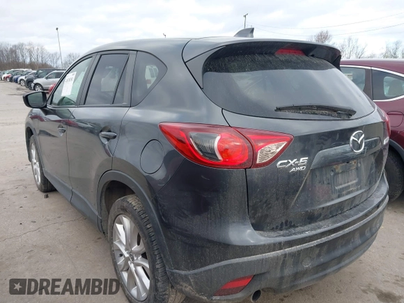 2015 Mazda CX-5 Grand Touring with VIN JM3KE4DY0F0479229, listed as a IAAI auction lot 41838381 with 139,843 mi miles. Bid and sale history available at carsss.com. Image 3.