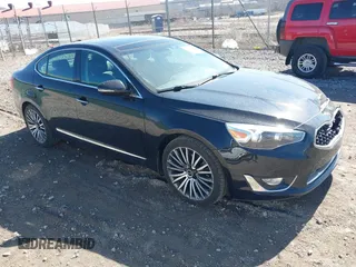 2014 Kia Cadenza Premium with VIN KNALN4D73E5140435, listed as a IAAI auction lot 41843037 with 126,555 mi miles and . Bid and sale history available at DreamBid. Image 1.