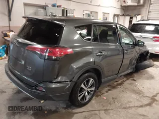 2018 Toyota RAV4 XLE with VIN 2T3RFREVXJW788412, listed as a IAAI auction lot 41931142 with 119,962 mi miles. Bid and sale history available at carsss.com. Image 4.
