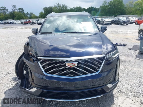 2022 Cadillac XT6 Premium Luxury with VIN 1GYKPCRS4NZ145145, listed as a IAAI auction lot 42533642 with 36,450 mi miles and . Bid and sale history available at DreamBid. Image 12.