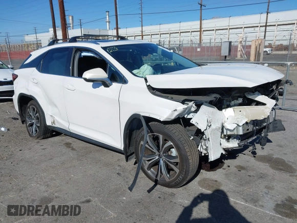 2022 Lexus RX with VIN 2T2HZMAA1NC232512, listed as a IAAI auction lot 41375711 with 27,599 mi miles. Bid and sale history available at carsss.com. Image 1.