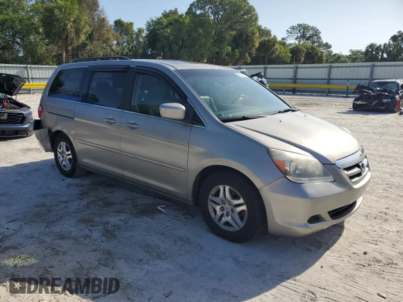 2007 Honda Odyssey EX-L with VIN 5FNRL387X7B043046, listed as a Copart auction lot 52604635 with 228,961 mi miles and Salvage Title. Bid and sale history available at carsss.com. Image 4.